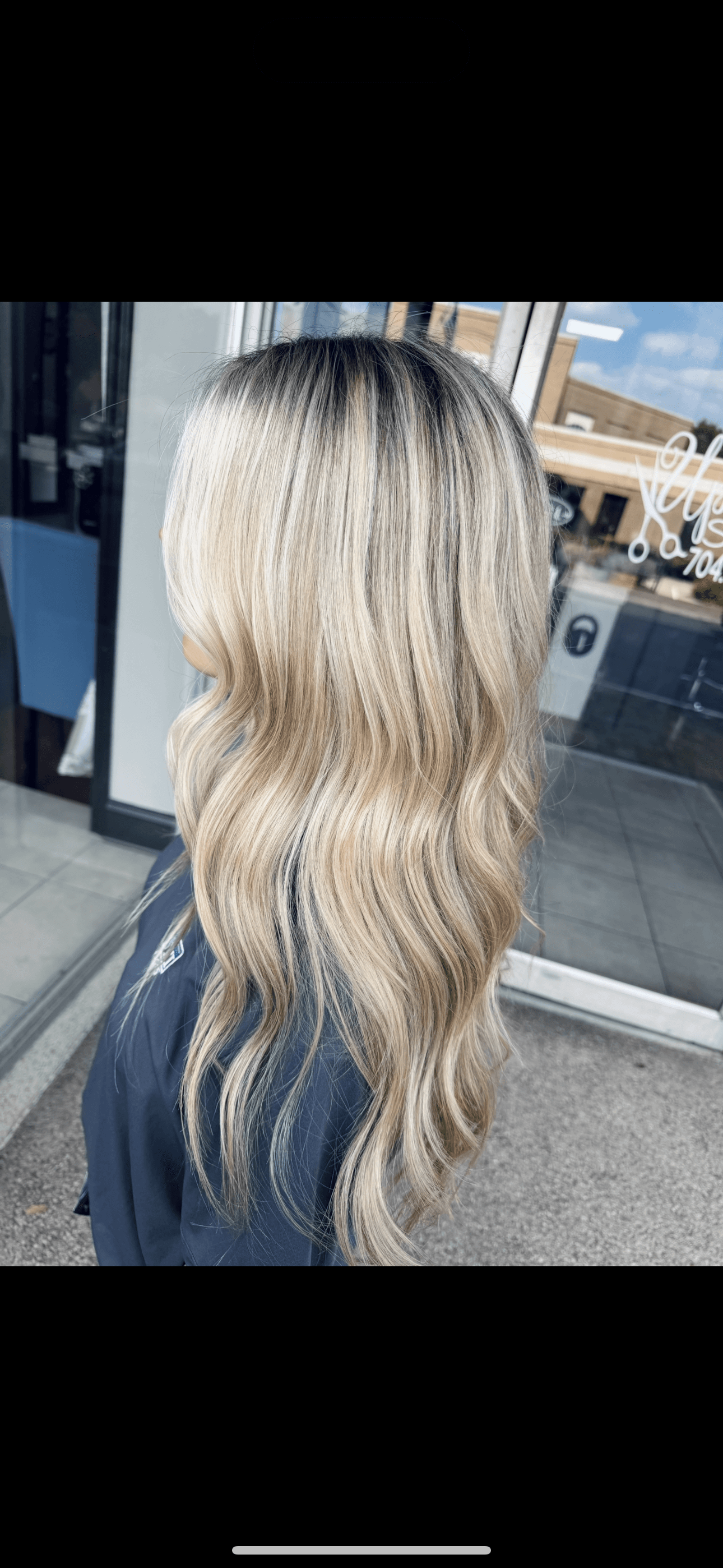 Platinum blonde dimensional balayage by Brooke Holland